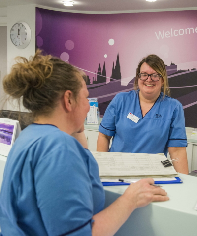 Two smiling nurses